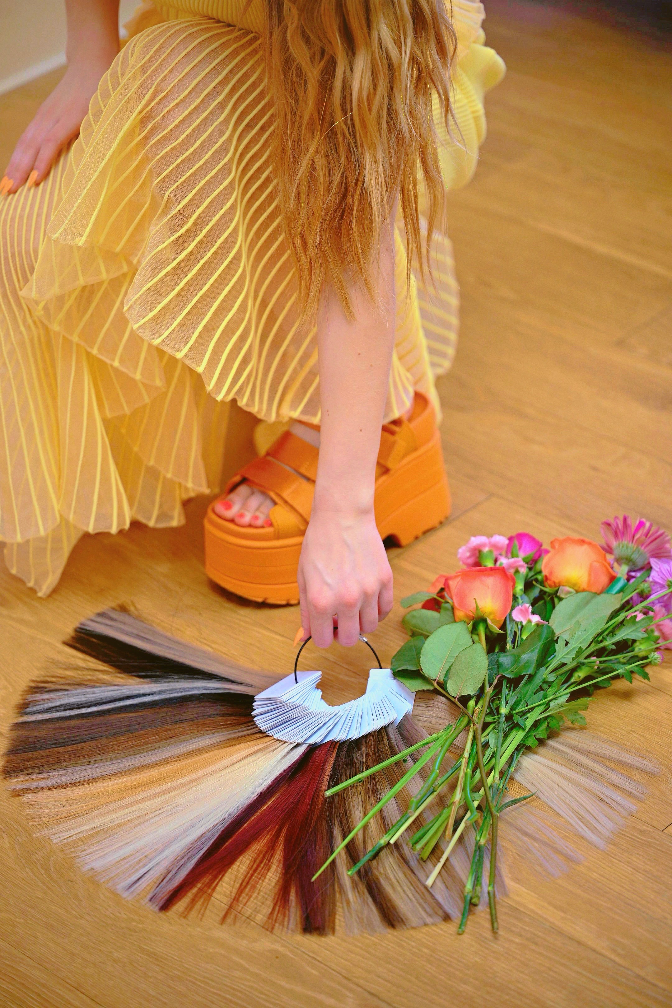 Hair extension color swatches and flowers